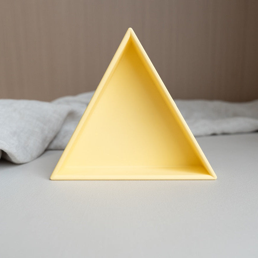 Grennn inlegdriehoek 'mandigo' pastel geel