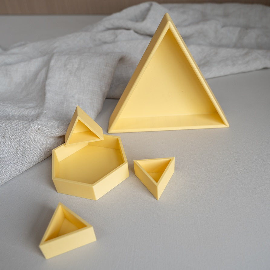 Grennn inlegdriehoek 'mandigo' pastel geel