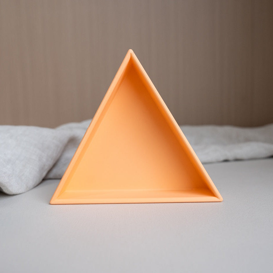 Grennn inlegdriehoek 'mandigo' pastel oranje