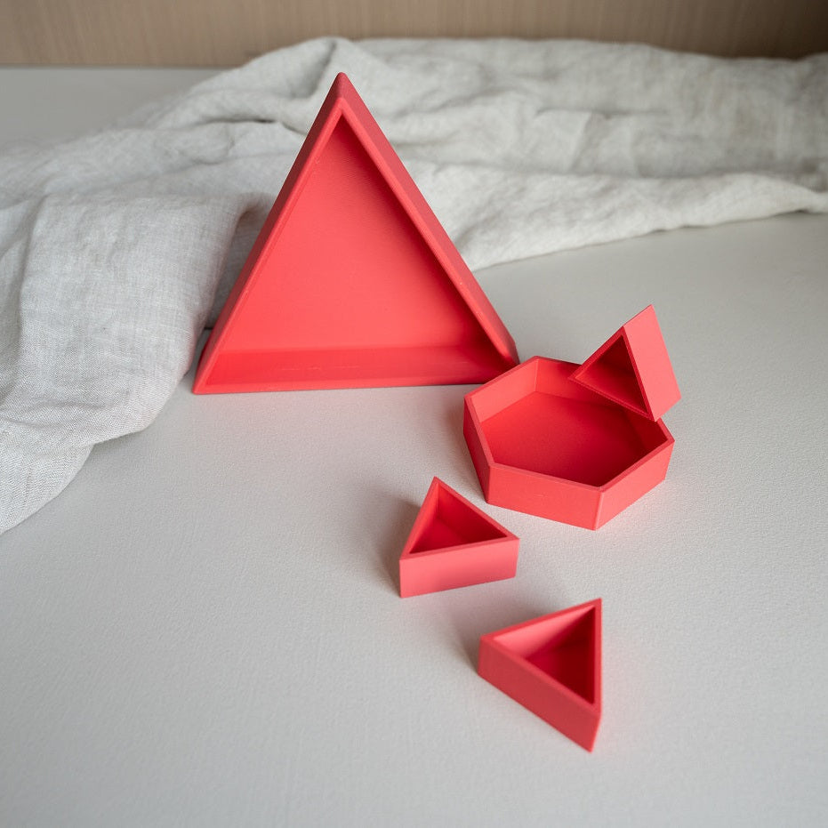 Grennn inlegdriehoek 'mandigo' pastel rood